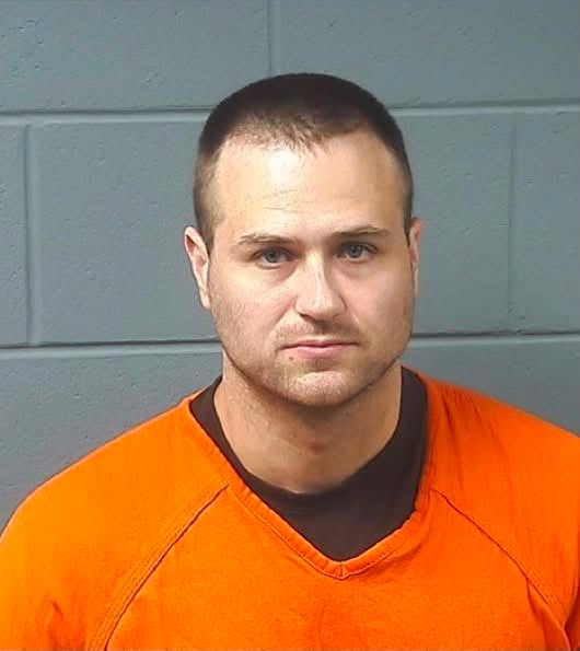 Booking photo — Aaron D. Johnson