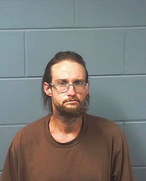 Booking photo — Colt O. Hornsby