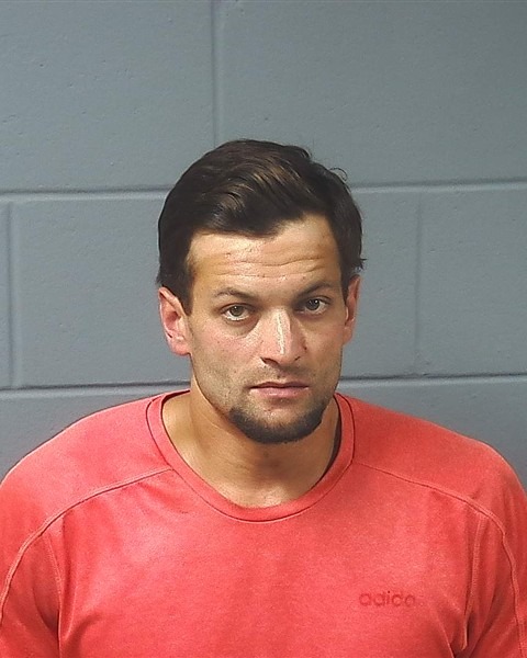 Booking photo — Austin J. Weeks
