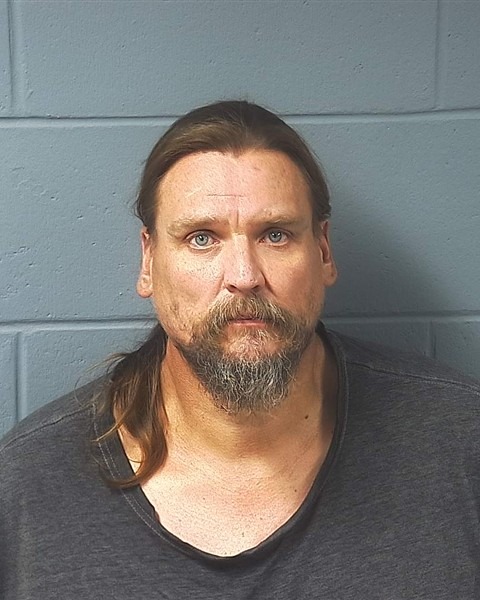Booking photo — Steven T. Tracy
