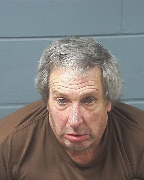 Booking photo — James F. Harvey